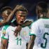 Keita Balde mobbed by team mates after his opener vs Kenya
